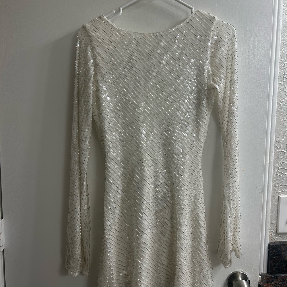 Meshki Nala Dress in white. Worn once for my wedding reception and it was a hit!